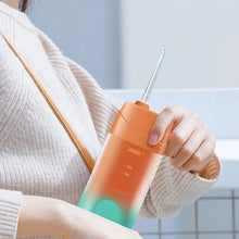 Заредете изображение във визуализатора на галерията – Electric oral irrigator 200 ml 4 tips RC-K-563 orange
