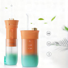 Заредете изображение във визуализатора на галерията – Electric oral irrigator 200 ml 4 tips RC-K-563 orange
