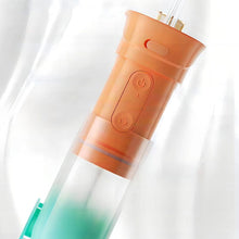 Заредете изображение във визуализатора на галерията – Electric oral irrigator 200 ml 4 tips RC-K-563 orange
