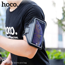 Заредете изображение във визуализатора на галерията – HOCO арmband за смартфон макс. 7 инча BAG01 черен
