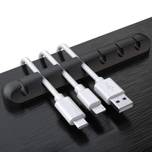 Заредете изображение във визуализатора на галерията – Blue Star PJ-OCZ8 silicone self-adhesive organizer for 7 cables - black (1 pc.)
