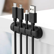 Заредете изображение във визуализатора на галерията – Blue Star PJ-OCZ23 silicone self-adhesive organizer for 4 cables - black (1 pc.)
