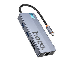 Заредете изображение във визуализатора на галерията – Adapter HUB 8w1 (HDTV+RJ45+SD/TF+PD+Type-C 3.0+USB 3.0 x 2) USB-C Hoco HB52 grey
