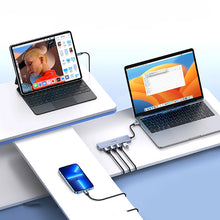 Заредете изображение във визуализатора на галерията – HUB Ugreen CM219 35574 with 4 USB-A 3.0 ports and USB-A 3.0 cable 1m - black
