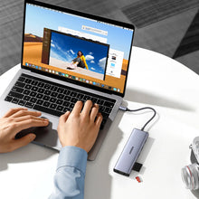Заредете изображение във визуализатора на галерията – Ugreen CM498 15600 USB-C adapter - 3x USB-A 3.0 / HDMI / VGA / RJ45 / SD / TF card reader / USB-C PD - gray
