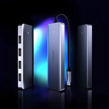 Заредете изображение във визуализатора на галерията – HUB Ugreen CM219 35574 with 4 USB-A 3.0 ports and USB-A 3.0 cable 1m - black
