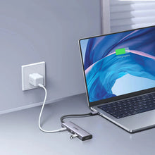 Заредете изображение във визуализатора на галерията – HUB Ugreen CM511 15597 5in1 USB-C - USB-C PD / HDMI / 3x USB-A 3.0 - gray
