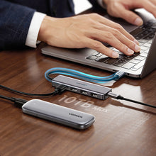 Заредете изображение във визуализатора на галерията – HUB Ugreen CM219 35574 with 4 USB-A 3.0 ports and USB-A 3.0 cable 1m - black
