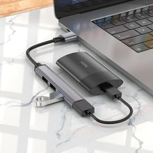 Заредете изображение във визуализатора на галерията – Adapter HUB 4in1 (USB 3.0+USB 2.0 x 3) USB-A Hoco HB26 szary
