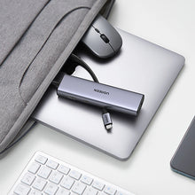 Заредете изображение във визуализатора на галерията – Ugreen CM512 90568 USB-C adapter - 2x USB-A 3.0 / HDMI / RJ45 / SD and TF card reader / USB-C PD 100W - gray

