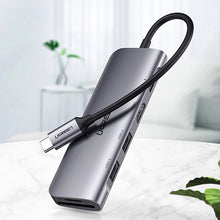 Заредете изображение във визуализатора на галерията – Ugreen CM195 ​​6in1 adapter USB-C - HDMI / 2x USB-A 3.0 / USB-C PD / SD / TF reader - gray

