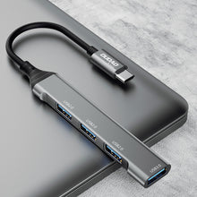 Заредете изображение във визуализатора на галерията – Dudao HUB 4in1 USB-C - 4x USB-A (3 x USB2.0 / USB3.0) 6.3cm black (A16T)
