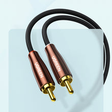 Заредете изображение във визуализатора на галерията – Ugreen cable audio cable 3.5 mm mini jack (male) - 2RCA (male) 2m copper (AV170)
