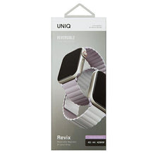 Заредете изображение във визуализатора на галерията – UNIQ pasek Revix Apple Watch Series 4/5/6/7/8/SE/SE2/Ultra 42/44/45mm. Reversible Magnetic lilak-biały/lilac-white - TopMag
