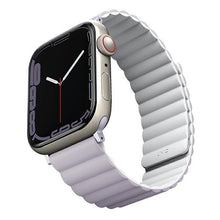 Заредете изображение във визуализатора на галерията – UNIQ pasek Revix Apple Watch Series 4/5/6/7/8/SE/SE2/Ultra 42/44/45mm. Reversible Magnetic lilak-biały/lilac-white - TopMag
