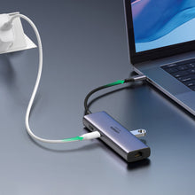 Заредете изображение във визуализатора на галерията – Ugreen 7in1 multi-functional HUB USB Type C - 2x USB 3.2 Gen 1 / HDMI 4K 60Hz / SD and TF card reader / USB Type C PD 100W / RJ45 1000Mbps (1Gbps) gray (60515 CM512)
