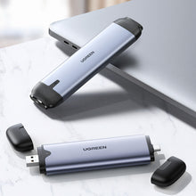 Заредете изображение във визуализатора на галерията – Ugreen Pocket Drive Enclosure M.2 M-Key (USB-C / USB-A 10Gb/s) gray (CM353)
