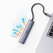Заредете изображение във визуализатора на галерията – Ugreen adapter converter HUB 5in1 USB C - 3x USB 3.0 / HDMI / RJ45 gray (CM475)
