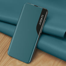 Заредете изображение във визуализатора на галерията – Eco Leather View Case elegant bookcase type case with kickstand for Xiaomi Redmi Note 10 / Redmi Note 10S orange
