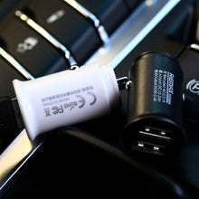 Заредете изображение във визуализатора на галерията – Remax Roki Series Car Charger RCC219 Mini Universal Car Charger 2x USB 2.4A black - TopMag
