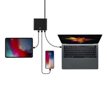 Заредете изображение във визуализатора на галерията – UNIQ Ład. siec. HUB Surge 90W czarny /charcoal black 2xUSB Quick Charge 3.0 + 2xUSB-C PD 3.0 (LITHOS Collective) - TopMag

