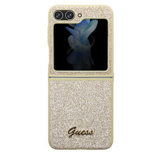 Заредете изображение във визуализатора на галерията – Original Case GUESS - hardcase Glitter Script GUHCZF5HGGSHD for Samsun Galaxy Z Flip 5 Gold
