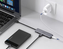 Заредете изображение във визуализатора на галерията – Ugreen USB HUB splitter - 4x USB 3.2 Gen 1 with micro USB power port gray (CM219 50985) - TopMag

