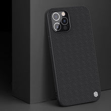 Заредете изображение във визуализатора на галерията – Nillkin Textured Case rugged cover with gel frame and nylon on the back iPhone 12 Pro Max black - TopMag
