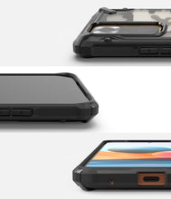 Заредете изображение във визуализатора на галерията – Ringke Fusion X Design durable PC Case with TPU Bumper for Xiaomi Redmi Note 10 Pro Camo Black (XDXI0023) - TopMag
