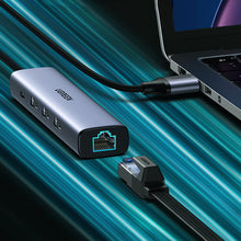 Заредете изображение във визуализатора на галерията – Ugreen 4in1 multi-functional HUB USB Type C - 3x USB 3.2 Gen 1 / RJ45 100Mbps gray (20917 CM475) - TopMag
