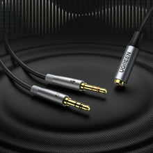 Заредете изображение във визуализатора на галерията – Ugreen AUX splitter cable 3.5 mm mini jack (female) - 2x 3.5 mm mini jack (male - microphone and headphones) silver (AV193 50255) - TopMag
