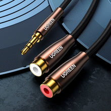 Заредете изображение във визуализатора на галерията – Ugreen cable audio cable 3.5 mm mini jack - 2xRCA (female) 25 cm black (AV194 50129) - TopMag
