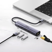 Заредете изображение във визуализатора на галерията – Ugreen multifunctional adapter HUB USB Type C - 3 x USB / Ethernet RJ-45 / USB Type C PD gray (CM475) - TopMag
