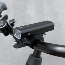 Заредете изображение във визуализатора на галерията – Wozinsky front bicycle lamp USB (up to 200lm) white light 4 operating modes black (WFBLB2) - TopMag

