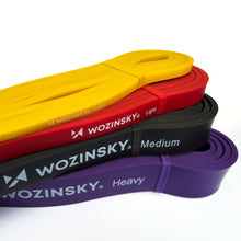 Заредете изображение във визуализатора на галерията – Wozinsky long exercise resistance bands set of 4x crossfit fitness bands (WRB4IN1) - TopMag
