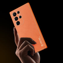 Заредете изображение във визуализатора на галерията – Dux Ducis Yolo elegant cover made of ecological leather for Samsung Galaxy S22 Ultra orange - TopMag
