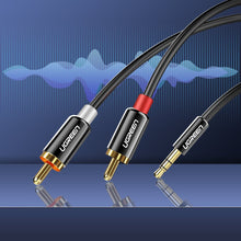 Заредете изображение във визуализатора на галерията – Ugreen cable audio cable 3.5 mm mini jack - 2RCA 2 m black (AV116 10584)
