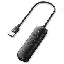 Заредете изображение във визуализатора на галерията – Ugreen HUB 4in1 USB - 4x USB Type A 3.0 PD DC 12V 0.25m black (CM416 10915) - TopMag
