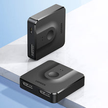 Заредете изображение във визуализатора на галерията – Ugreen CM430 signal splitter 2x DisplayPort (input) to 1x DisplayPort (output) 4K / 1080p switch black (60622) - TopMag
