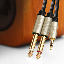 Заредете изображение във визуализатора на галерията – Ugreen cable audio cable mini jack 3.5 mm - 2 x jack 6.35 mm 1m gray (AV126)
