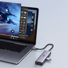 Заредете изображение във визуализатора на галерията – Ugreen 7in1 multi-functional HUB USB Type C - 2x USB 3.2 Gen 1 / HDMI 4K 60Hz / SD and TF card reader / USB Type C PD 100W / RJ45 1000Mbps (1Gbps) gray (60515 CM512)
