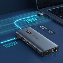 Заредете изображение във визуализатора на галерията – Choetech multifunctional HUB with display 12in1 USB-C to USB-C / USB-A / HDMI / VGA / AUX / SD / TF gray (HUB-M26)
