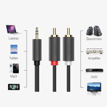Заредете изображение във визуализатора на галерията – Ugreen cable audio cable 3.5 mm mini jack (male) - 2RCA (male) 1.5 m (AV102)
