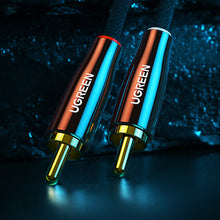 Заредете изображение във визуализатора на галерията – Ugreen cable audio cable 3.5 mm mini jack (male) - 2RCA (male) 2m copper (AV170)
