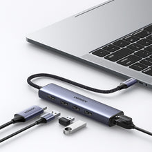 Заредете изображение във визуализатора на галерията – Ugreen adapter converter HUB 5in1 USB C - 3x USB 3.0 / HDMI / RJ45 gray (CM475)
