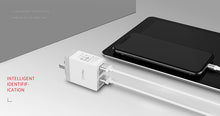 Заредете изображение във визуализатора на галерията – Recci Wall Charger Cube RUC5003 - 4xUSB - 2,1A CN/US plug Orange + EU adapter
